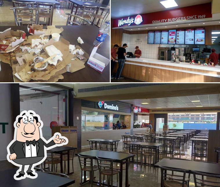 Take a seat at one of the tables at Wendy’s Neemrana - Drive Thru