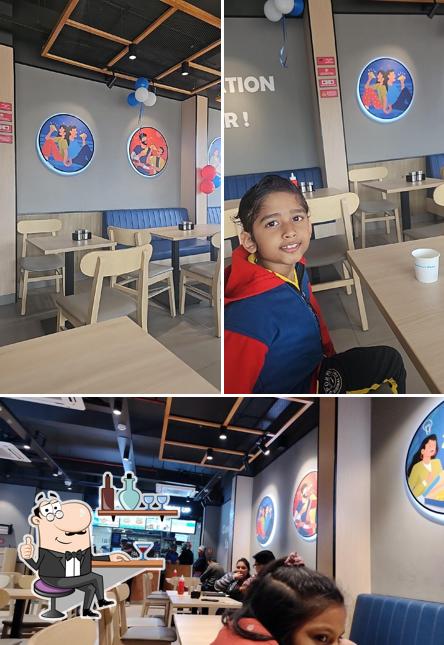 The interior of Domino's Pizza Bagmugaliya, Bhopal
