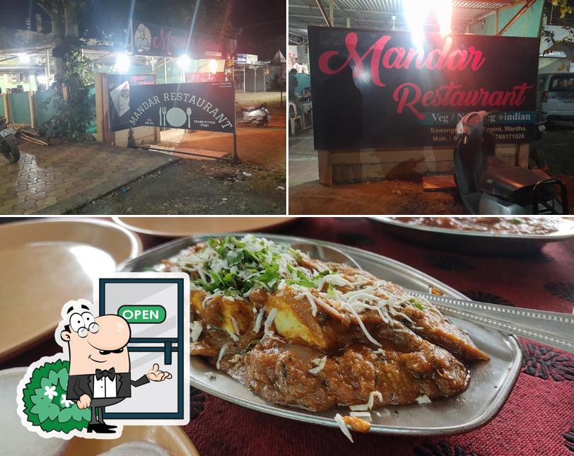 Among various things one can find exterior and food at Mandar Dhaba