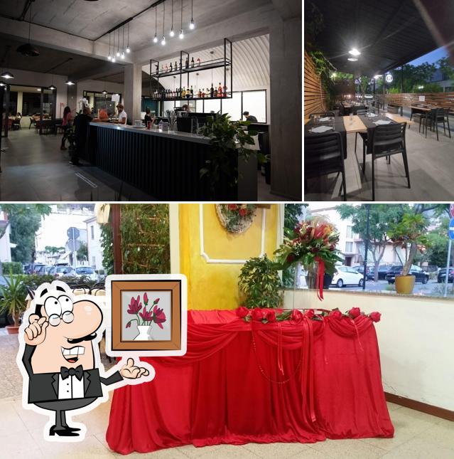 Dai un'occhiata agli interni di Rinaldi Pizzeria