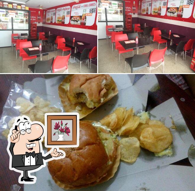 This is the picture depicting interior and food at Taj Bakery