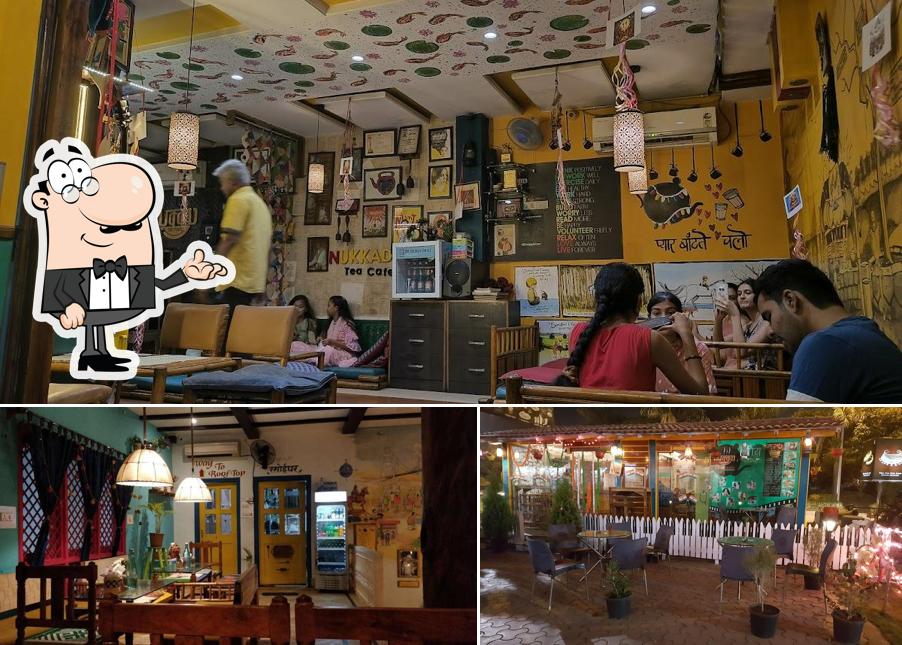 Take a seat at one of the tables at Nukkad Tea Cafe