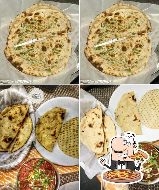 Try out pizza at Olive Era