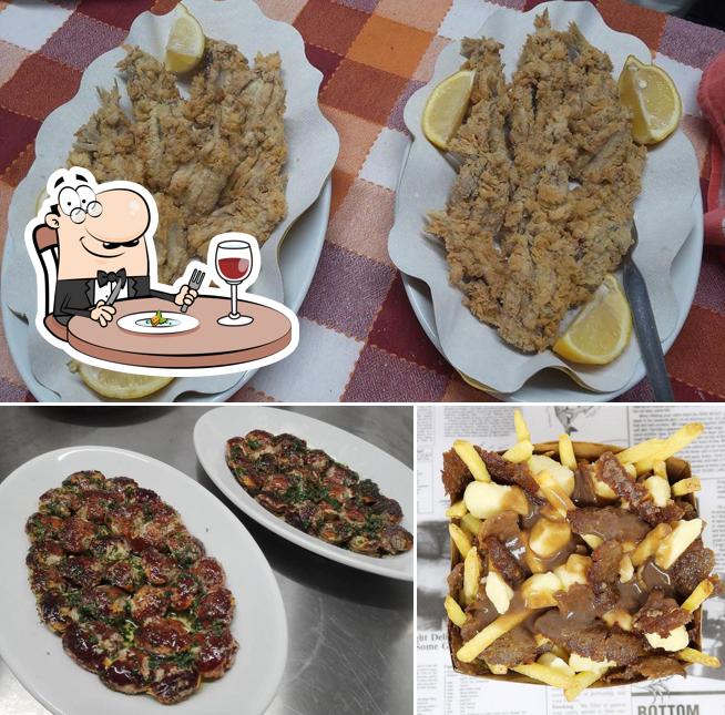 Dai un’occhiata alla immagine che mostra la cibo e tavolo da pranzo di Osteria Varaschin