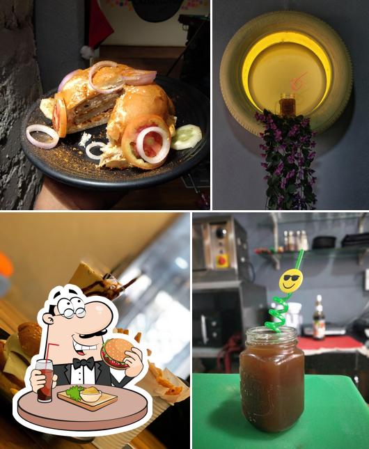 Order a burger at Cafe cues and cushions