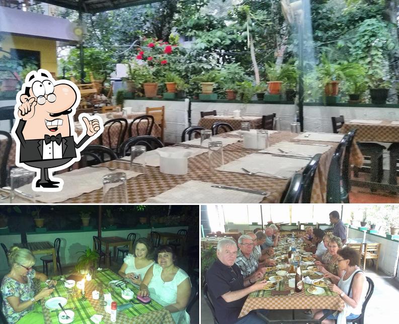 The interior of Adithi Homestay Spice Garden Restaurant