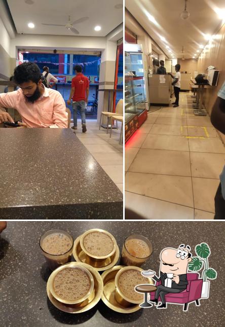 This is the image depicting interior and food at Velan Express Eats