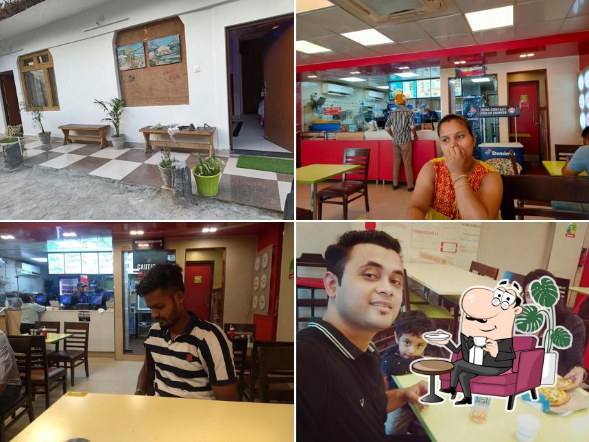 Take a seat at one of the tables at Domino's Pizza City Centre, Rishikesh