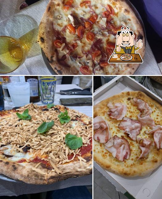 Scegli una pizza a La Taverna Ristorante
