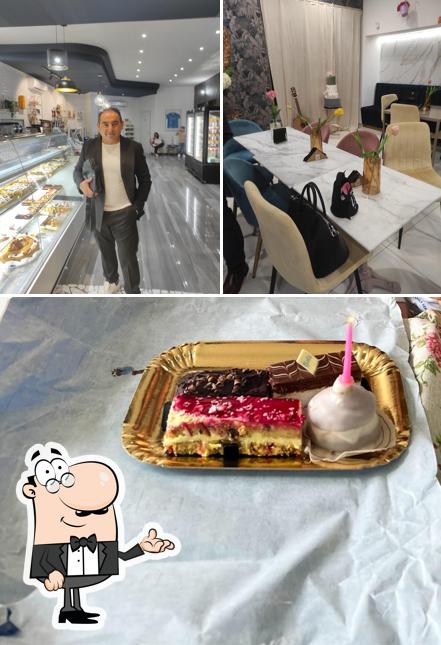 BAKE - Pasticceria Caffetteria si caratterizza per la interni e torta