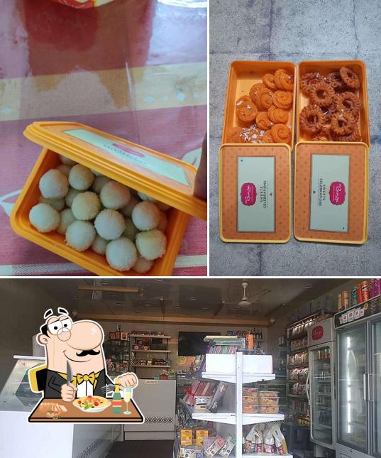 Check out the photo showing food and interior at C.N. Bumiya