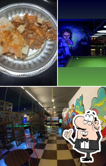 Take a seat at one of the tables at Eat Play Repeat