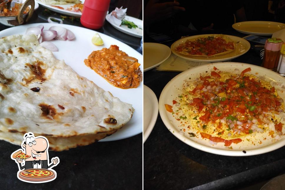 Pick pizza at PALLAVI HOTEL