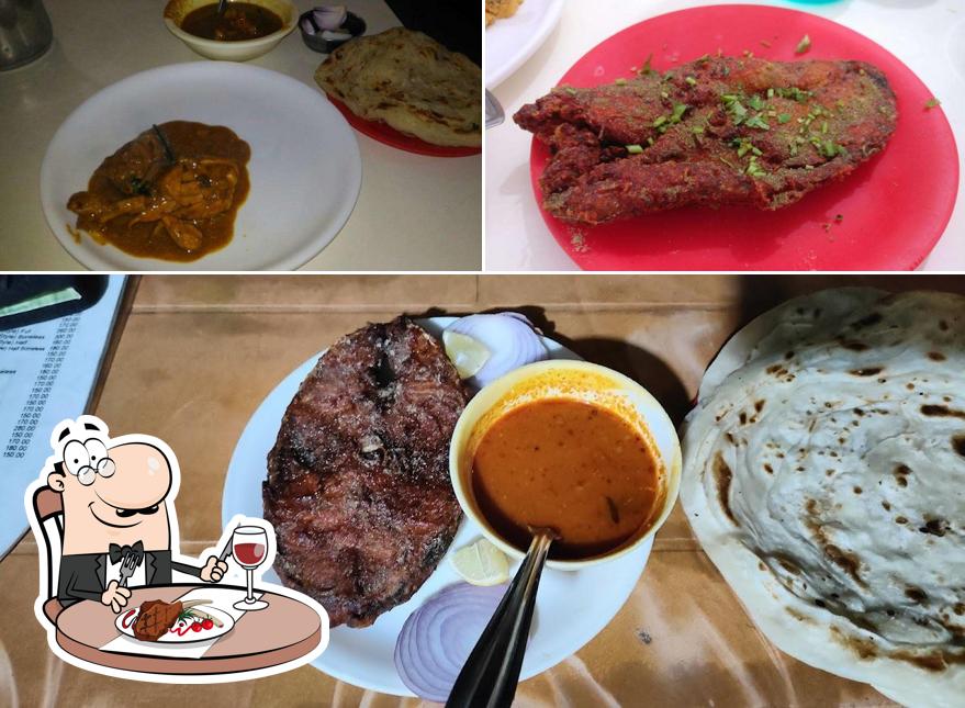 Order meat meals at Cochin Ark Restaurant