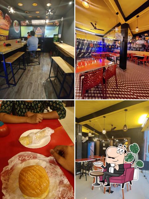Take a seat at one of the tables at God's Own Burger Broasted