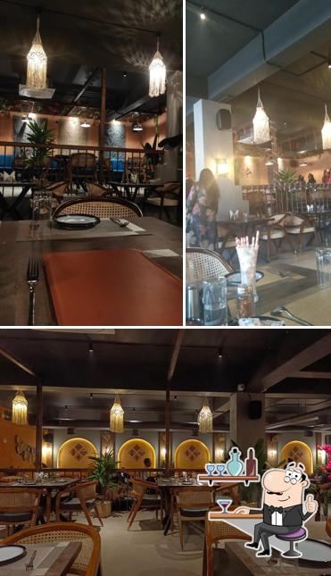 Take a seat at one of the tables at Dusk & Dine