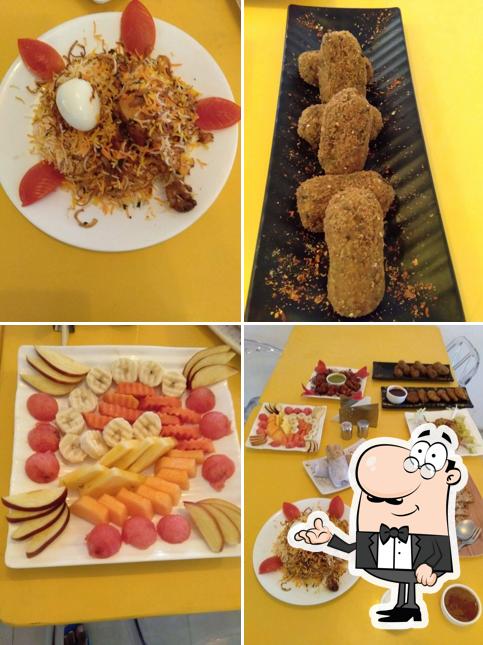 Check out the photo depicting interior and food at The Vizag Cafe