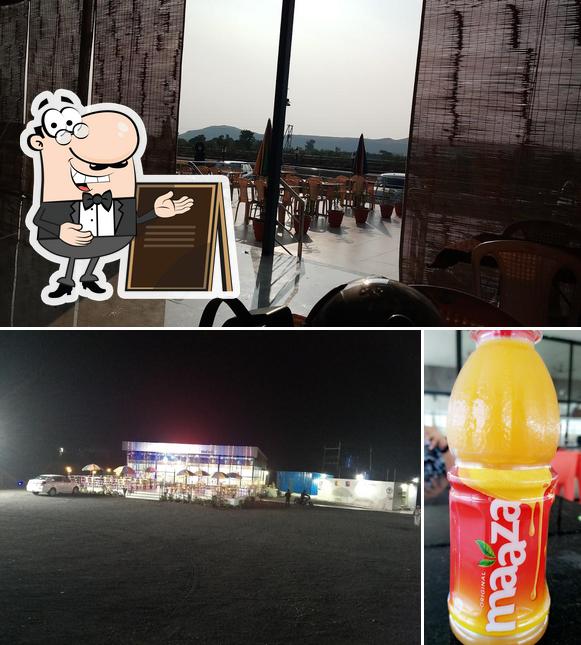This is the picture showing exterior and beverage at Hotel Krishna Garden