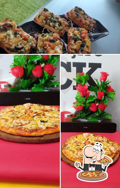 Try out pizza at THE LOVE LOCK CAFE