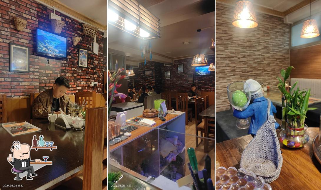 Take a seat at one of the tables at Chhwela Restaurant