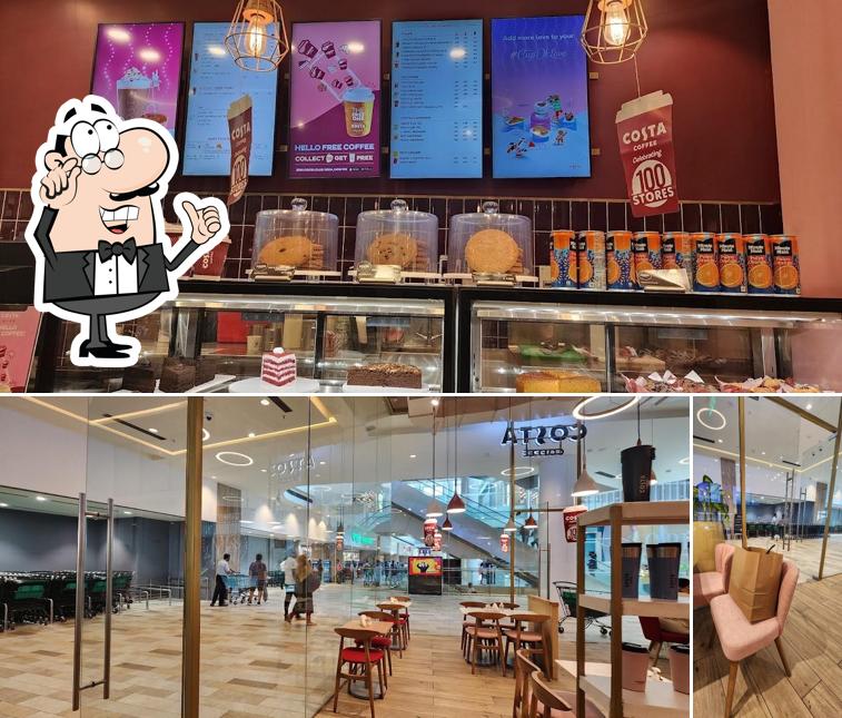 Take a seat at one of the tables at Costa Coffee