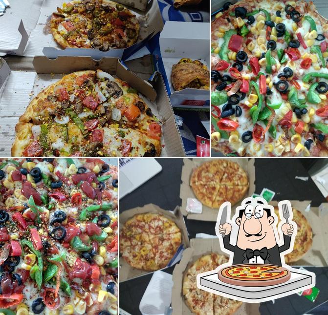 At Domino's Pizza Village Chechuru, Phagwara, you can get pizza