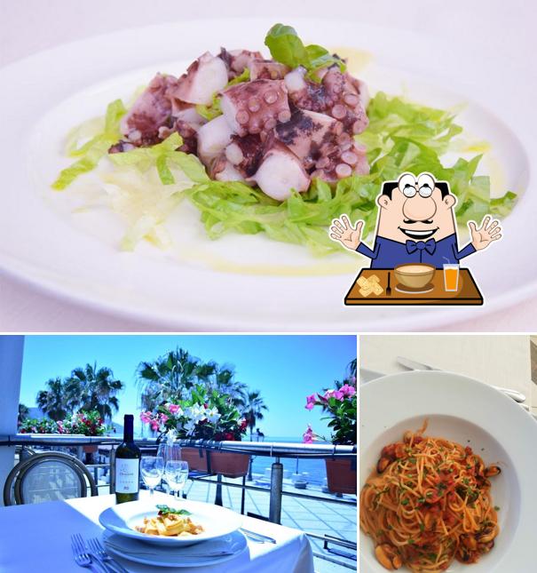 Questa è la foto che raffigura la cibo e tavolo da pranzo di Grand Hotel Victoria