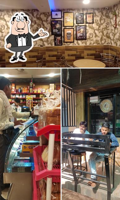 Take a seat at one of the tables at Mircharam Sweets