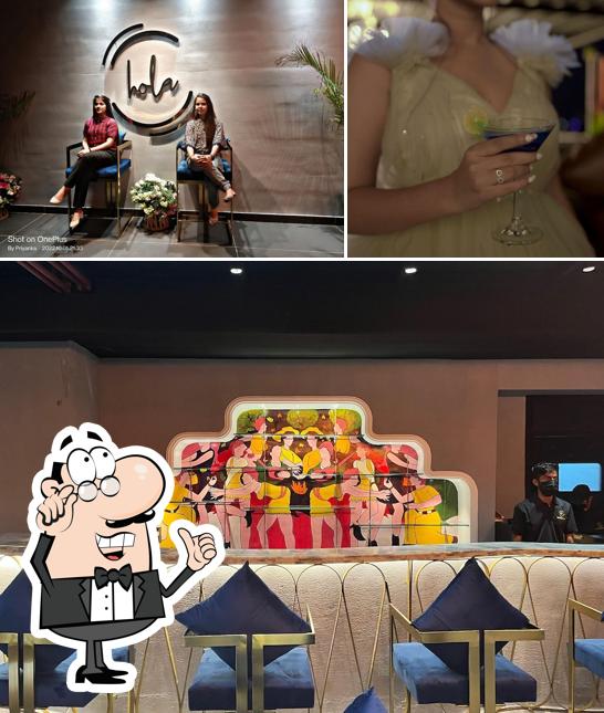 The photo of Hola Skylounge and Kitchen’s interior and alcohol