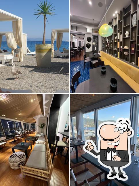 Siediti a un tavolo di Oasi al Mare Beach Club