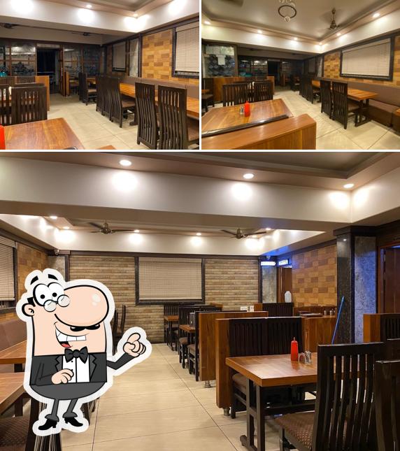 Take a seat at one of the tables at Udupi vaibhava