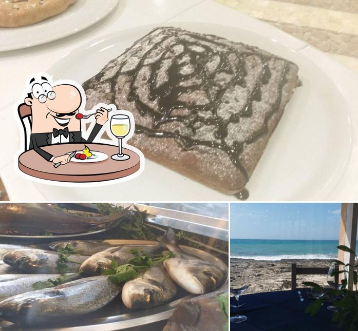 La foto della cibo e esterno di Bella Napoli Racale