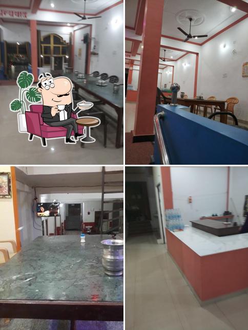 Take a seat at one of the tables at Pradhan Dhaba