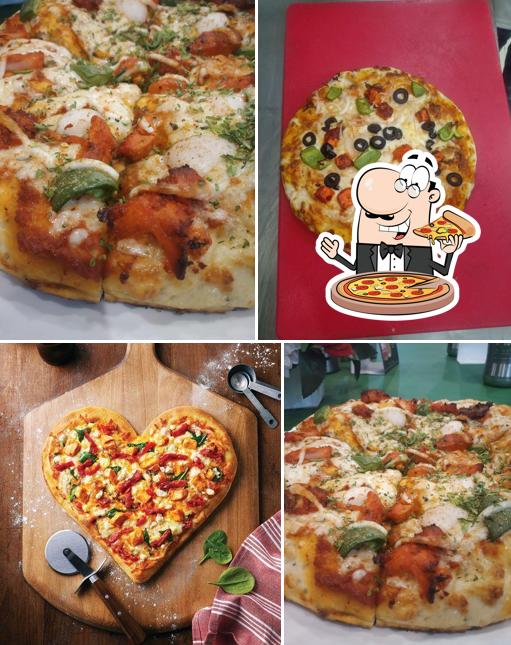 Get pizza at Food Planet Resturant