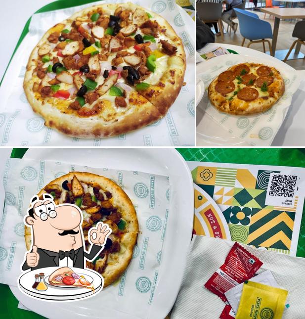 Try out pizza at Pizza Ricotta (Secura Mall)