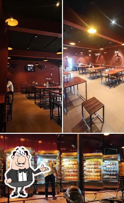 Take a seat at one of the tables at T&T Kondotty