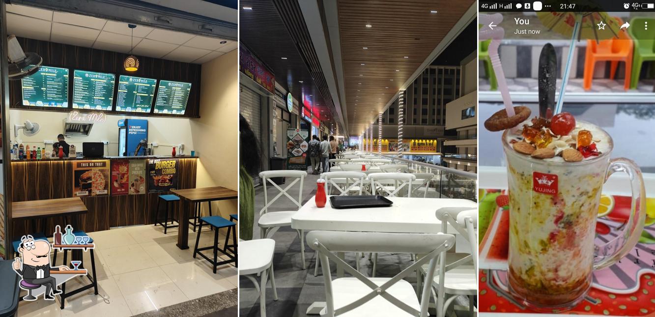 Take a seat at one of the tables at Zero Mile (the foodie's destination)