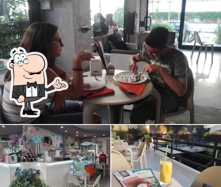 Siediti a un tavolo di Alguer Caffe'