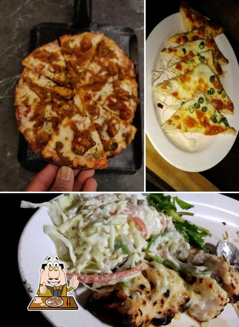Try out pizza at Cafe Ecstasy