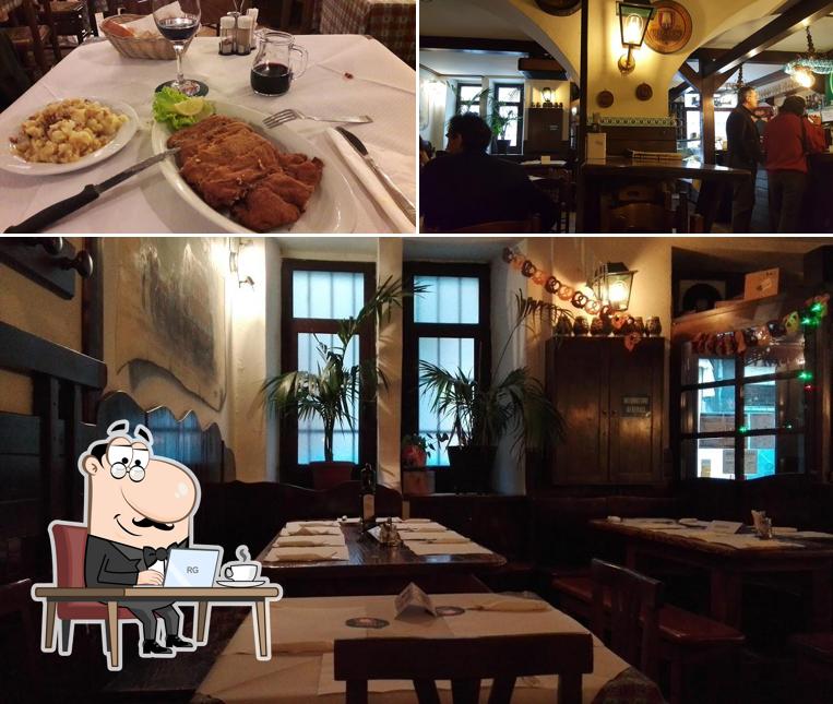 Installez-vous à l'une des tables de Buffet Birreria da Rudy
