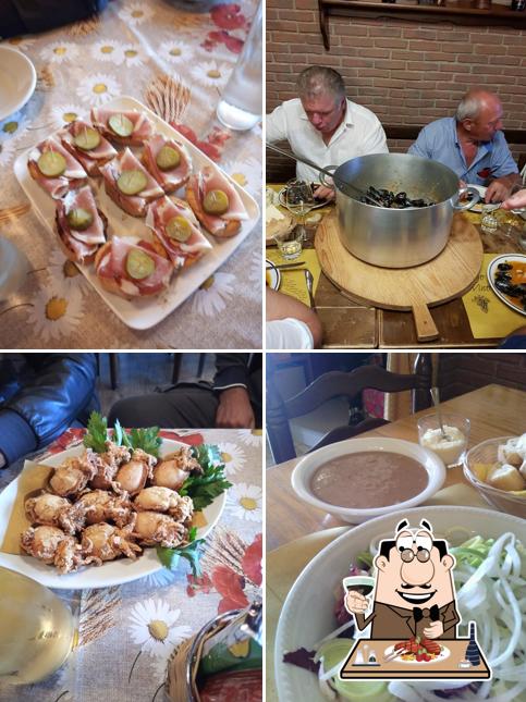 Prenditi i un pasto a base di carne a Osteria Valcasoni