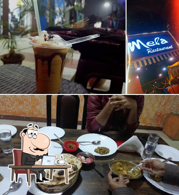 Take a seat at one of the tables at bhatti ka swad by mela