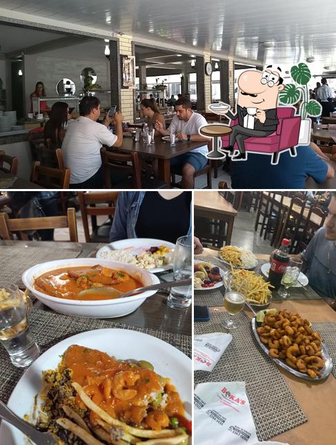 Sente em uma das mesas no Bokas Kobrasol