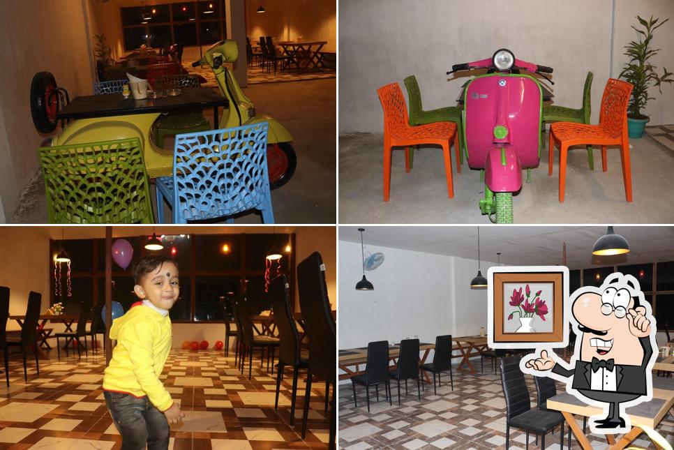 Take a seat at one of the tables at HIDEOUT RESTAURANT