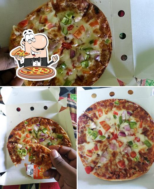 Try out pizza at Creamy nuts cafe