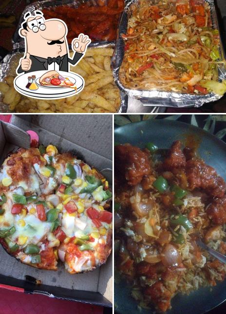 Get pizza at Uncle's Treat