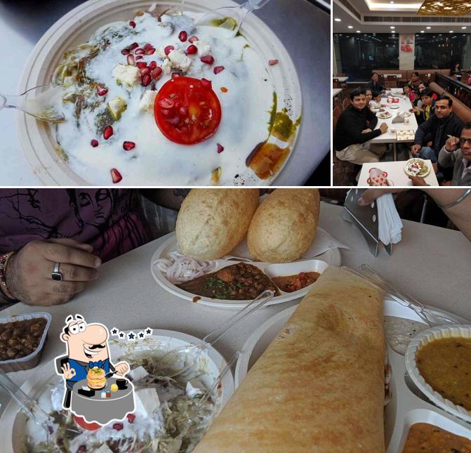 Among different things one can find food and dining table at BTW