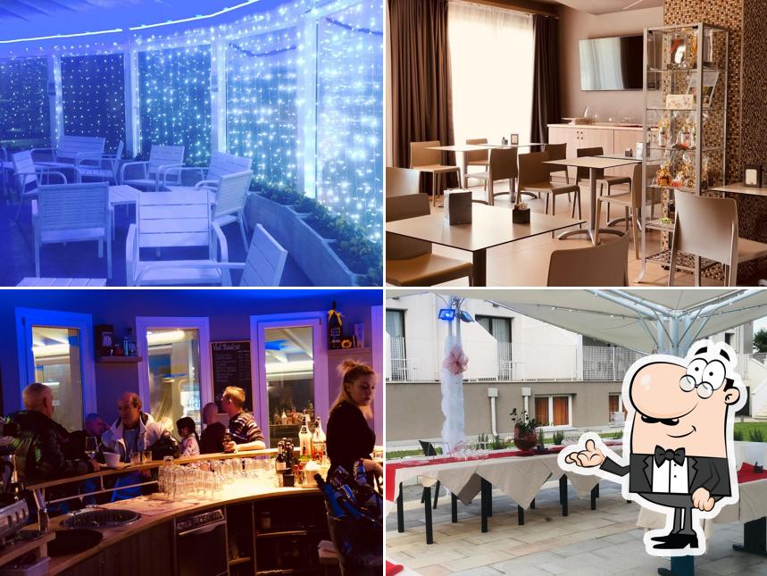 Siediti a un tavolo di Enjoy BAR - HOTEL - SPA