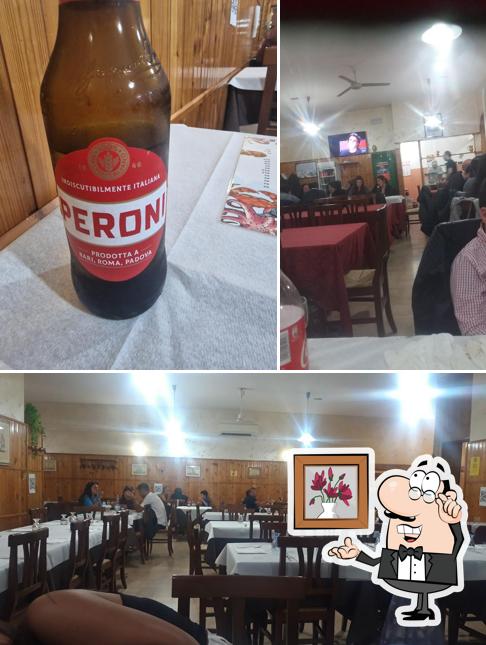 La foto della interni e bevanda di Trattoria Ristorante Pizzeria Nicola's