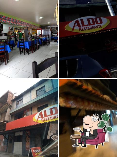 Sente em uma das mesas no Aldo Restaurante